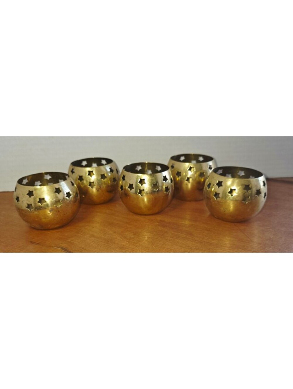 Set of five vintage solid brass votive candle holders